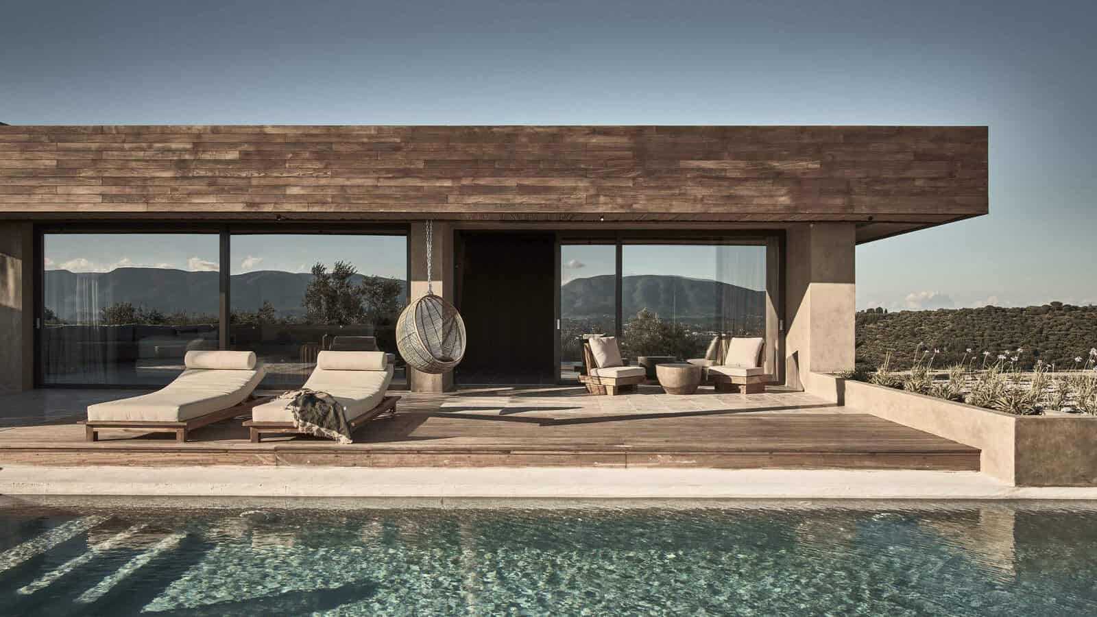 Bekijk meer foto's van Olea All Suite op Zakynthos Loungen aan het zwembad van het minimalistisch ingerichte designhotel Olea All Suite op Zakynthos